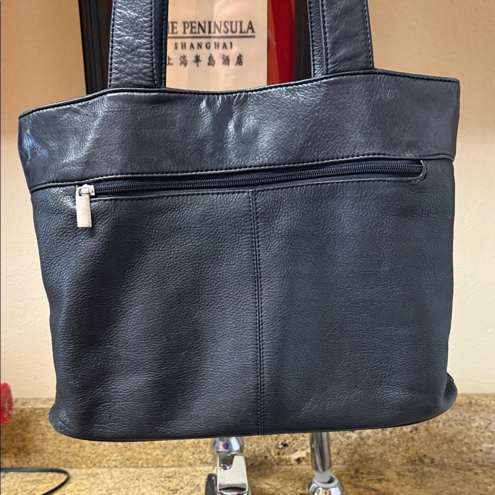 Black Leather purse, which was purchased in Bellagio Italy